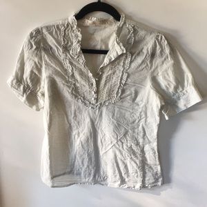 White ruffled blouse
